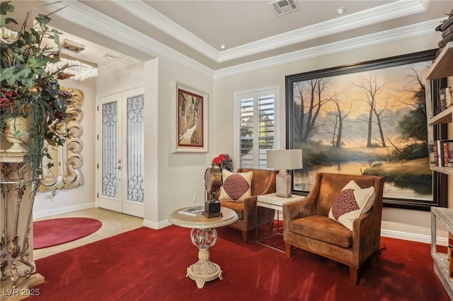 living area with carpet floors, french doors, and crown molding