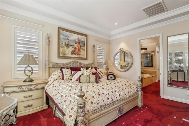 carpeted bedroom featuring connected bathroom, crown molding, and a tray ceiling