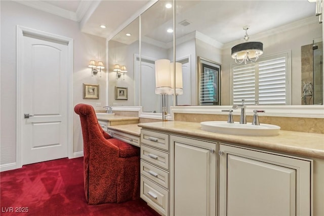 bathroom featuring ornamental molding and vanity