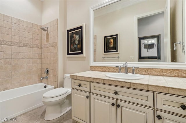 full bathroom featuring toilet, vanity, tile patterned flooring, and tiled shower / bath combo