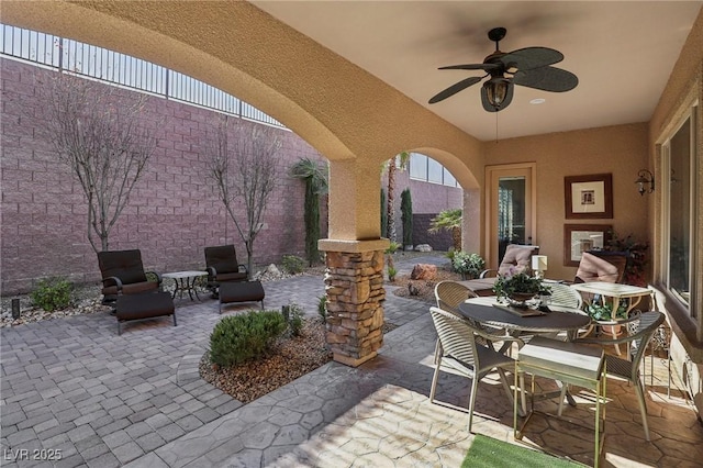 view of patio / terrace with ceiling fan