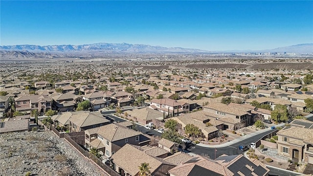 drone / aerial view featuring a mountain view