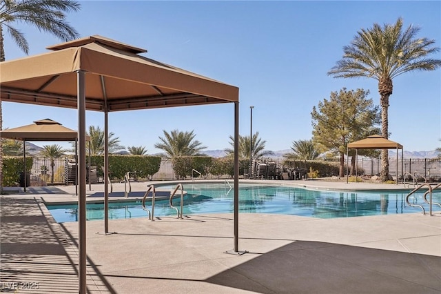 view of pool featuring a gazebo and a patio