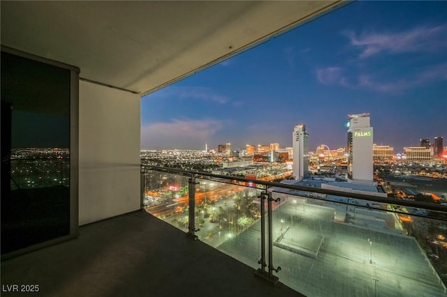 view of balcony at dusk