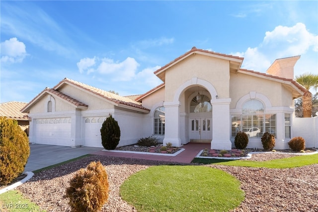 view of front of property with a garage