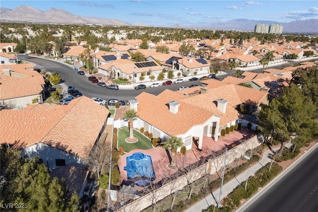 bird's eye view with a mountain view