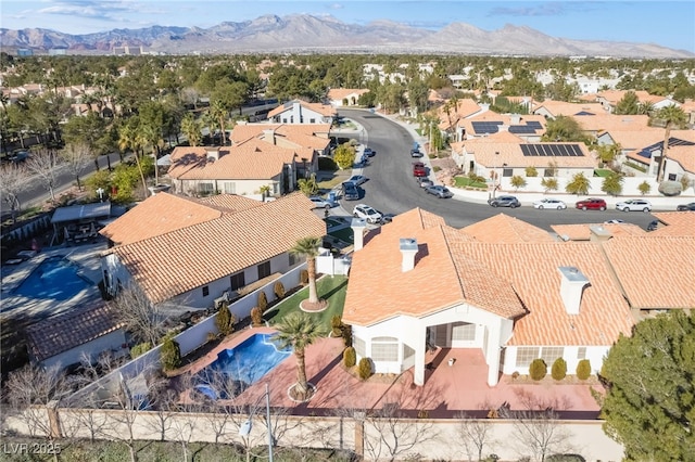 drone / aerial view featuring a mountain view