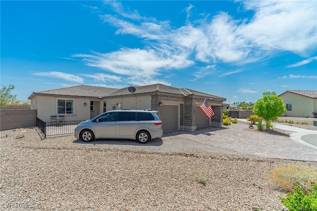 single story home with a garage