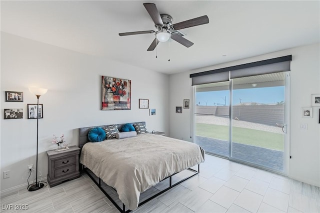 bedroom featuring access to exterior and ceiling fan