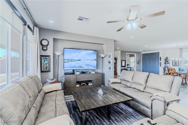 living room featuring ceiling fan