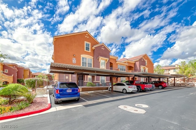 view of car parking featuring a carport