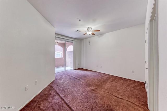 unfurnished room featuring carpet floors and ceiling fan