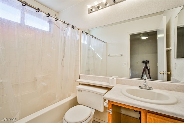 full bathroom featuring toilet, vanity, and shower / bath combo with shower curtain