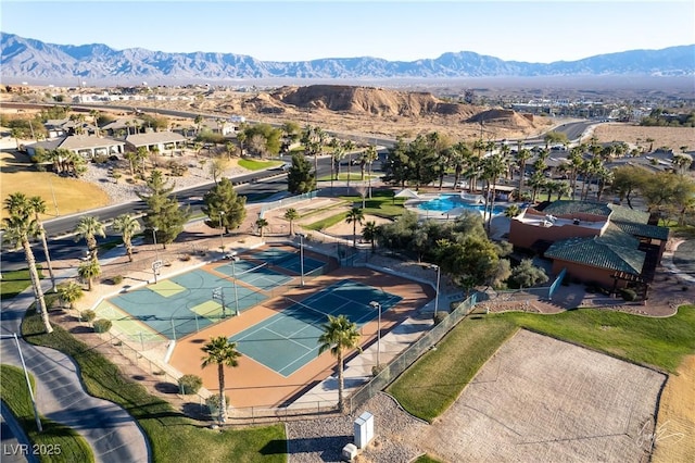 birds eye view of property featuring a mountain view