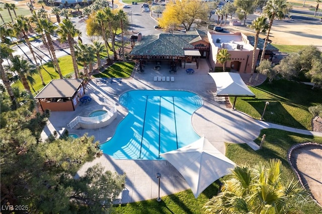 view of pool featuring an in ground hot tub and a patio area