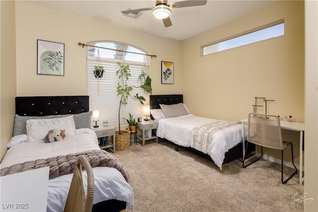 bedroom featuring ceiling fan and carpet flooring