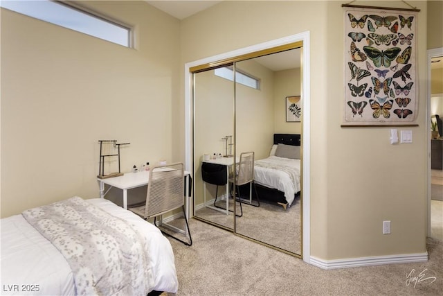 carpeted bedroom with a closet