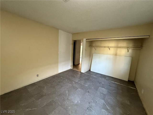 unfurnished bedroom with a closet