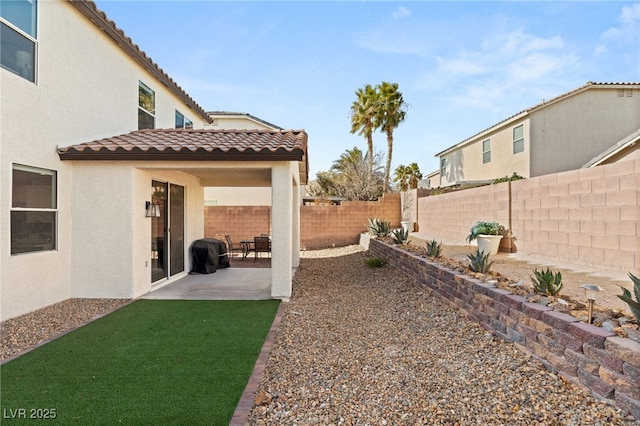 view of yard with a patio area