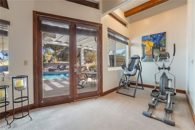 workout area with light colored carpet