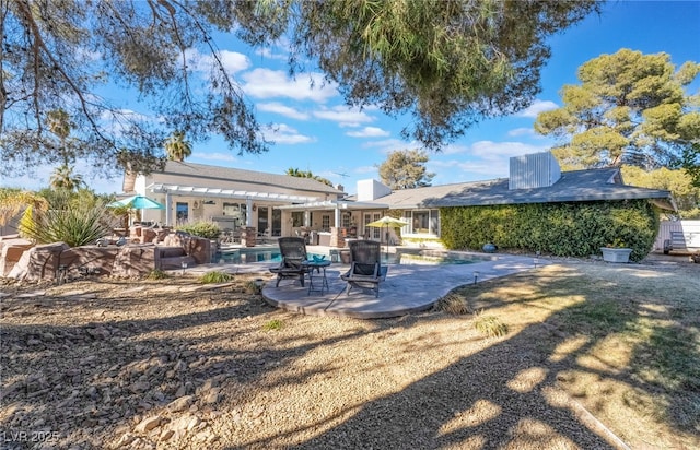 view of yard featuring a patio area, a pergola, and a fenced in pool