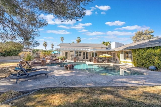 view of pool featuring a patio area