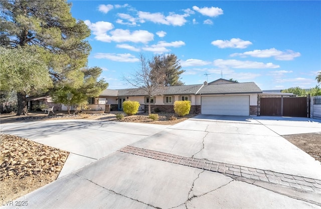 ranch-style house featuring a garage