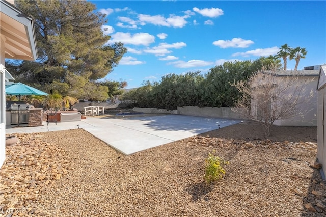 exterior space featuring an outdoor kitchen