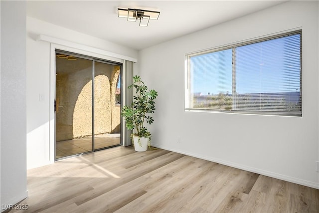 unfurnished room featuring light hardwood / wood-style flooring