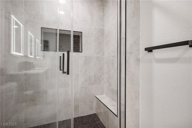 bathroom featuring walk in shower