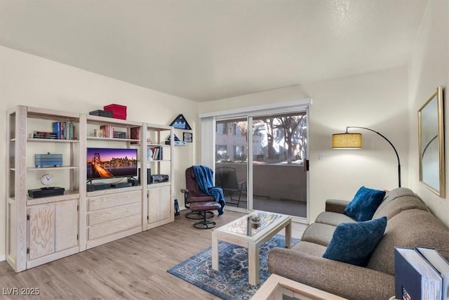 living room with light hardwood / wood-style floors