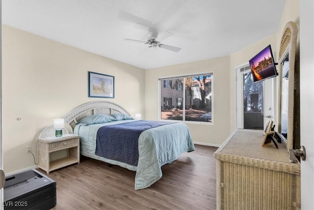 bedroom featuring wood-type flooring and ceiling fan