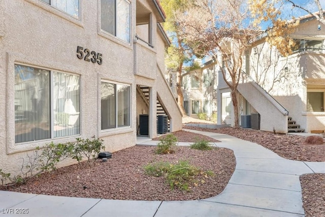 exterior space featuring central AC unit