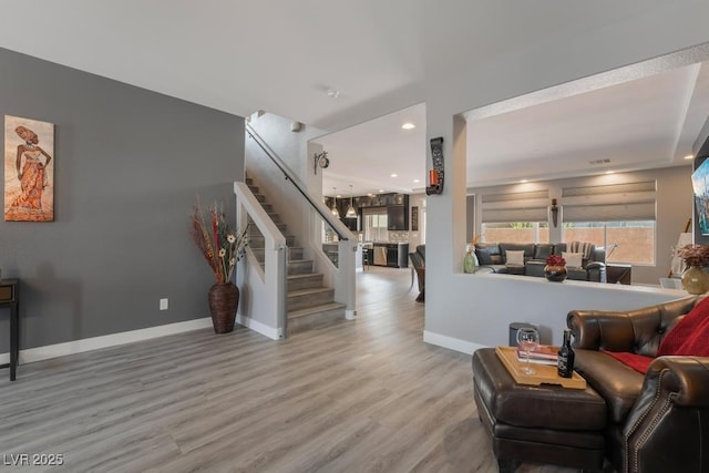 living room with hardwood / wood-style floors