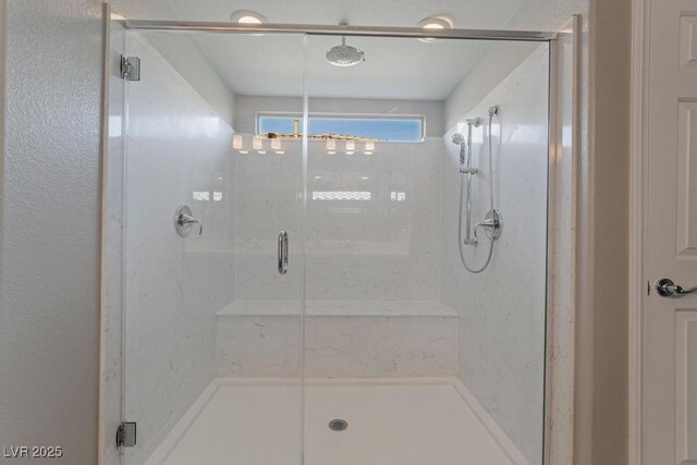 bathroom featuring walk in shower