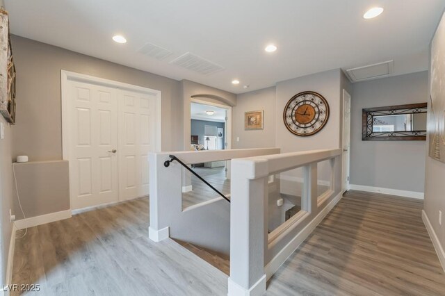 hall featuring wood-type flooring