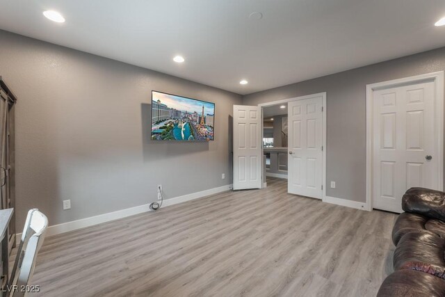 unfurnished living room featuring light hardwood / wood-style flooring