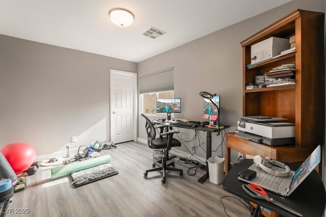 home office featuring light wood-type flooring