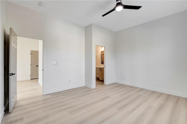 unfurnished bedroom featuring ceiling fan, light hardwood / wood-style flooring, and ensuite bath