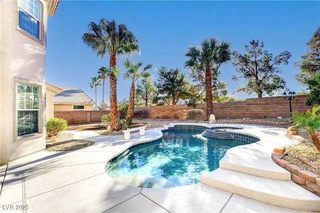 view of pool featuring a patio