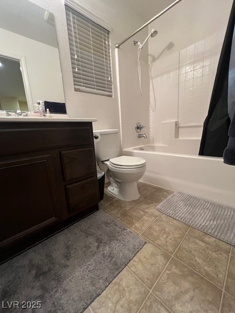 full bathroom with toilet, vanity, tile patterned floors, and shower / bathtub combination with curtain