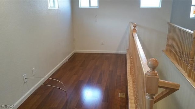 interior space with dark hardwood / wood-style floors