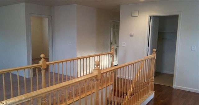 hall with dark hardwood / wood-style flooring