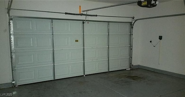 garage featuring a garage door opener