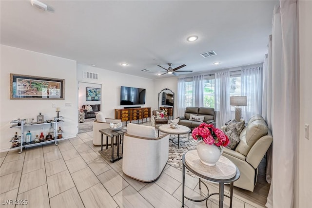 living room featuring ceiling fan