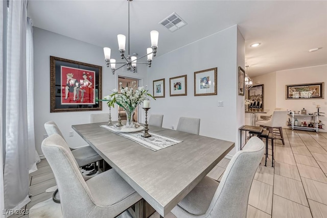 dining area with a chandelier