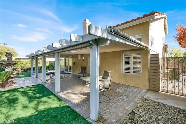 back of house featuring a patio