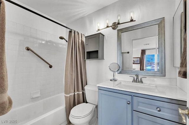 full bathroom featuring toilet, vanity, and shower / bath combination with curtain