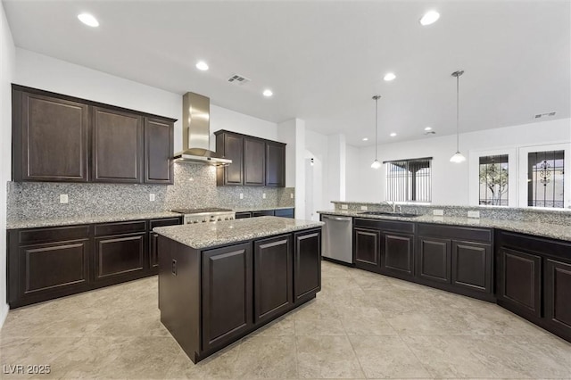 kitchen with a center island, dishwasher, dark brown cabinets, hanging light fixtures, and wall chimney range hood