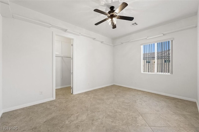 empty room featuring ceiling fan